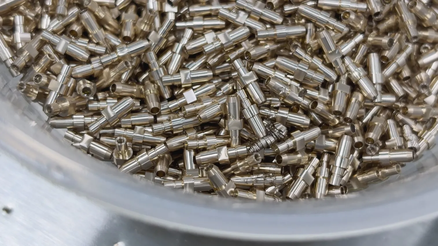 Micro-turned brass connector contacts machined at OUJI